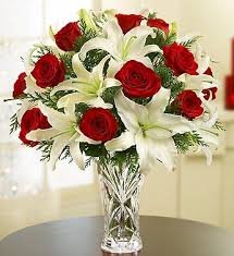 ONE DOZEN RED ROSES AND WHITE LILIES